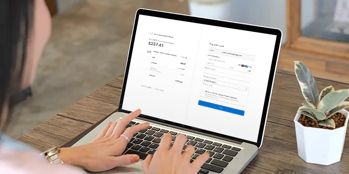 Laptop with payment webpage on screen